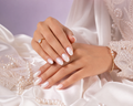 Pearl Almond Press-on Nails worn by a Middle Eastern hand model