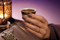 Soft Taupe Press-on Nails worn by a Middle Eastern hand model